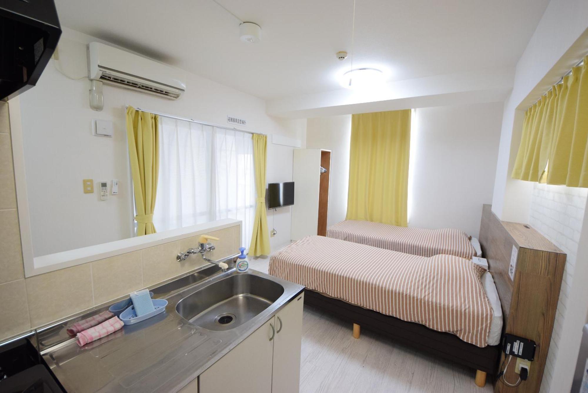 Stay In Sumuka Shintoshin Naha Buitenkant foto